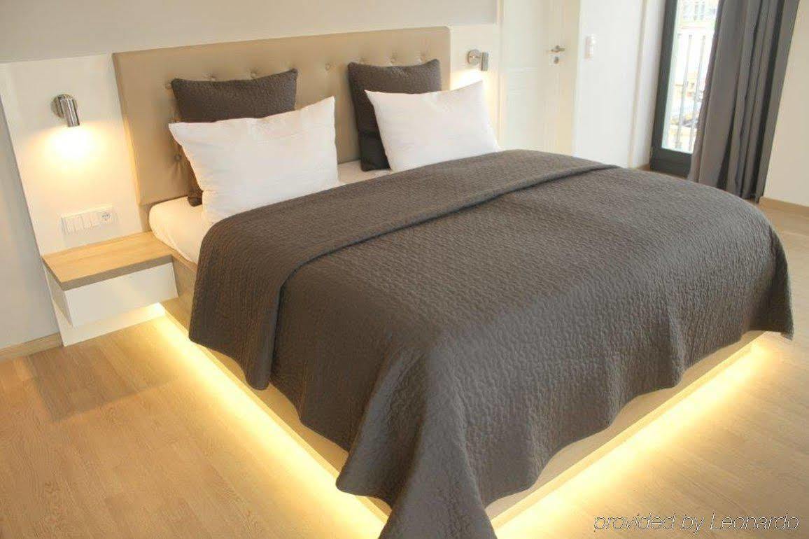 리시덴츠 암 츠스윙 드레스덴 외부 사진 A modern bedroom